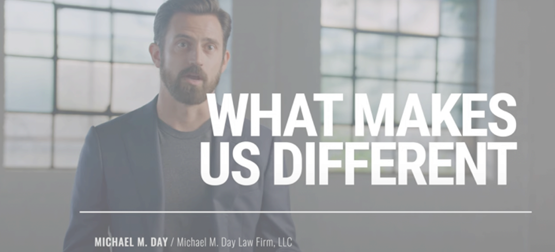 attorney michael m day stands before tall windows beside bold text reading “what makes us different."